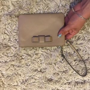 Beige coach wristlet